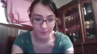 Nerdy girl with glasses masturbates with a toy for her bf on skype