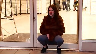 Public cameltoe and pissing show from a girl in fur